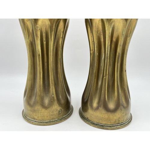 1357 - A pair of WWI Trench Art brass shell case vases, dated 1918 - approx. 29cm high