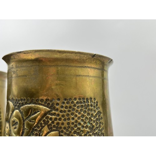 1357 - A pair of WWI Trench Art brass shell case vases, dated 1918 - approx. 29cm high