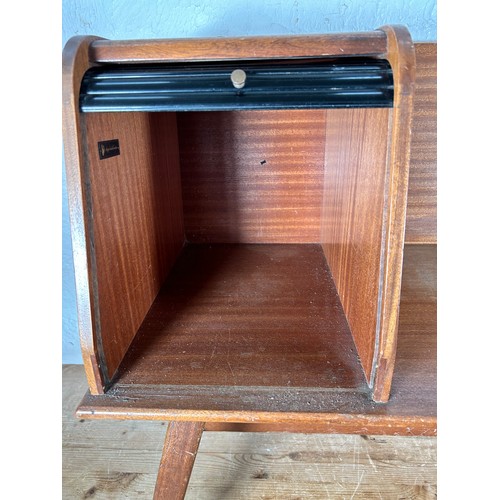 102 - A Chippy Heath teak telephone seat - approx. 70cm high x 82cm wide x 42cm deep