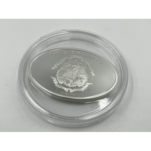 1368 - A boxed 2005 Republic of Liberia R.M.S. Titanic - Expedition 2000 .925 silver 10 dollar coin with ce... 