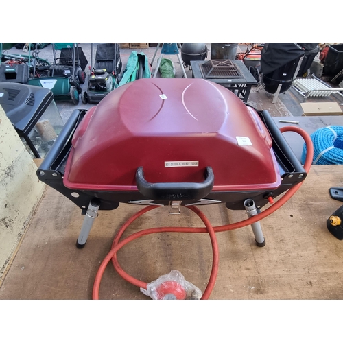 818 - A portable table top gas BBQ