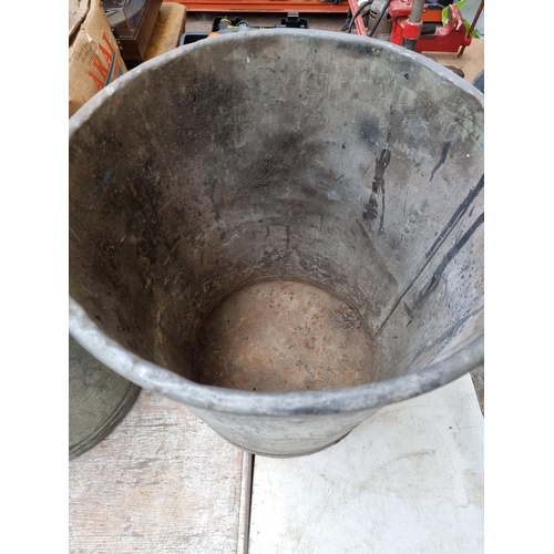 836 - A vintage galvanised twin handled dustbin - approx. 61cm high x 49cm diameter