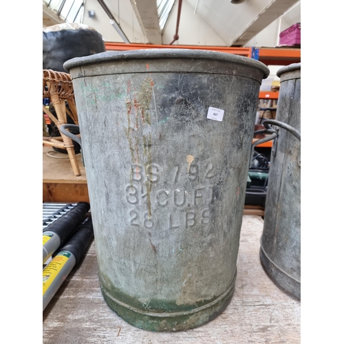 837 - A vintage galvanised twin handled dustbin - approx. 61cm high x 49cm diameter