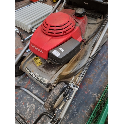 851 - Two Honda mowers, one HC16 and one HCRB423