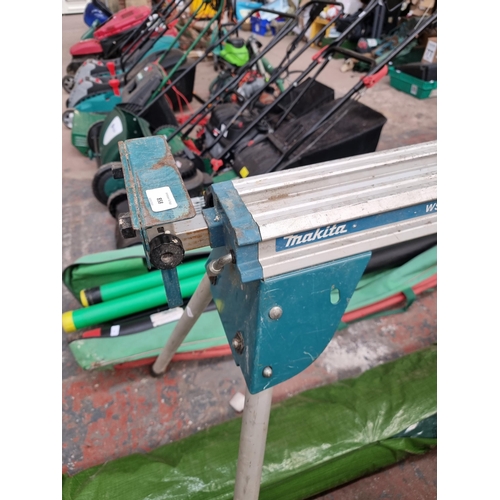 858 - A Makita WST06 mitre saw stand