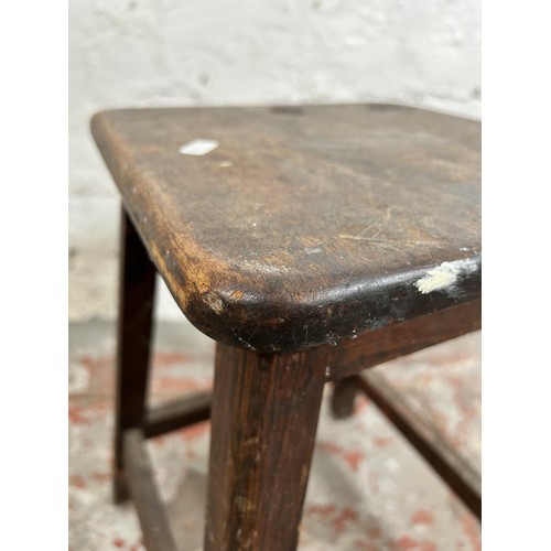 9 - A mid 20th century oak and beech lab stool - approx. 48cm high x 32cm square