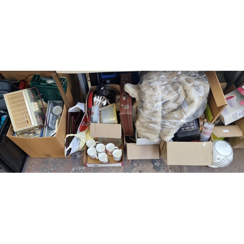 906 - Seven boxes containing brassware, ceramics, glassware, vintage Philips all transistor reel to reel p... 