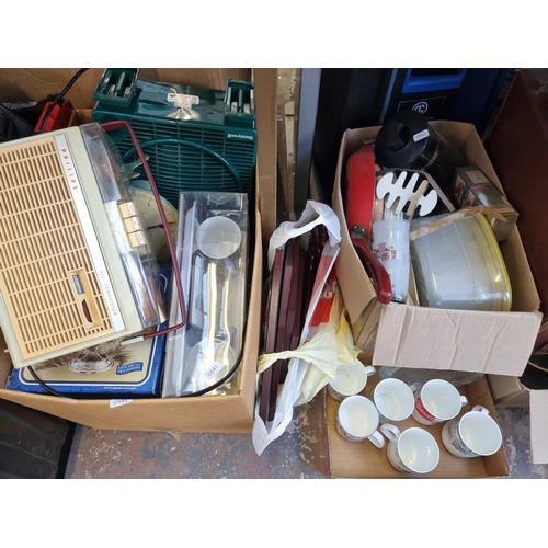 906 - Seven boxes containing brassware, ceramics, glassware, vintage Philips all transistor reel to reel p... 