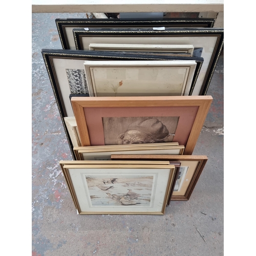 932 - A collection of framed prints