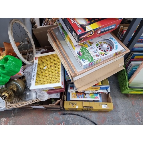 948 - A collection of house clearance items to include plastic toolboxes, framed prints, board games, Dupl... 