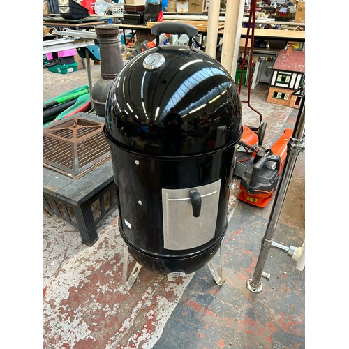 854 - A Weber Smokey Mountain cooker - approx. 104cm high