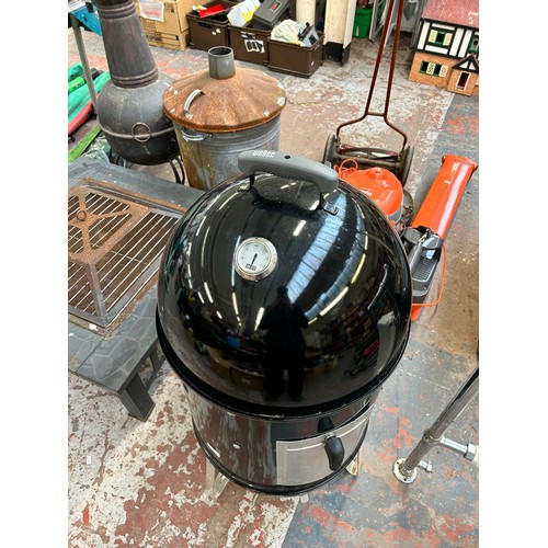 854 - A Weber Smokey Mountain cooker - approx. 104cm high