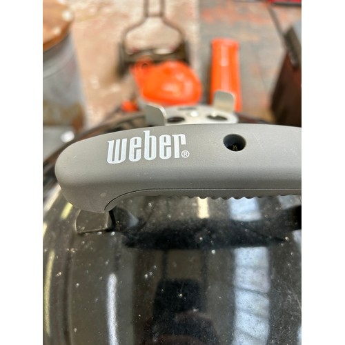 854 - A Weber Smokey Mountain cooker - approx. 104cm high