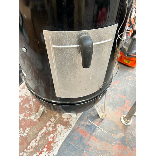 854 - A Weber Smokey Mountain cooker - approx. 104cm high