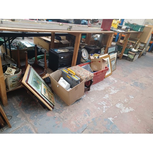 877 - A large collection of house clearance items to include framed prints, Salter coin checking scales, R... 