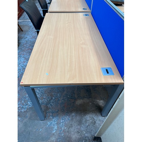 94 - A modern beech effect and grey metal double desk - approx. 163cm long x 161cm wide x 73cm high