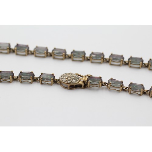 1008 - A 9ct gold mystic topaz fancy link bracelet with diamond set clasp - approx. gross weight 6.1 grams