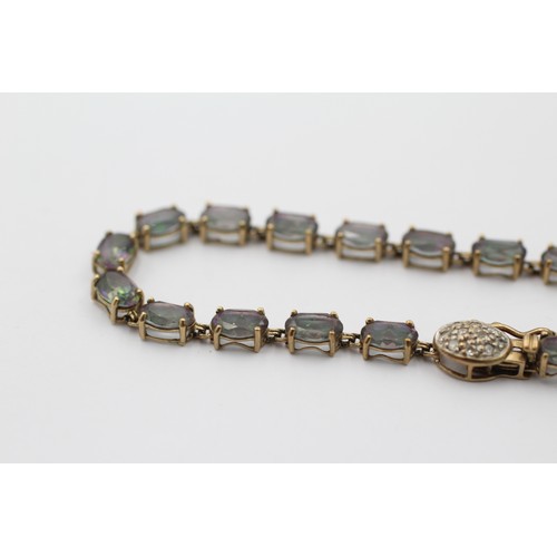 1008 - A 9ct gold mystic topaz fancy link bracelet with diamond set clasp - approx. gross weight 6.1 grams