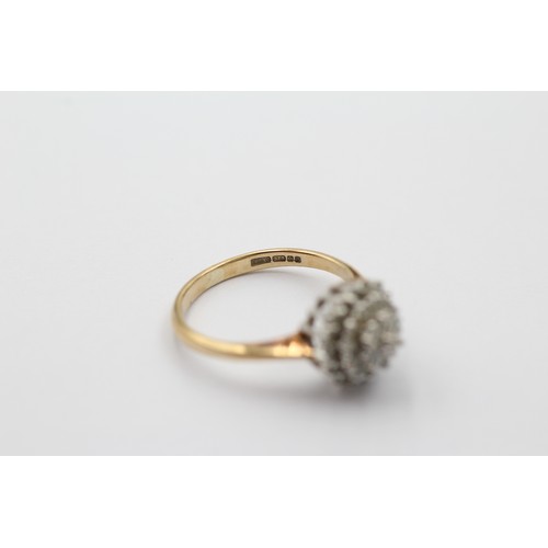 1013 - A 9ct gold diamond halo ring, size M½ - approx. gross weight 2.4 grams