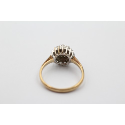 1013 - A 9ct gold diamond halo ring, size M½ - approx. gross weight 2.4 grams