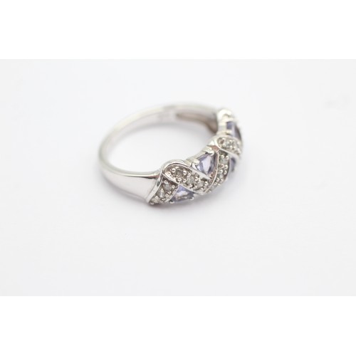 1021 - A 9ct white gold diamond and tanzanite dress ring, size L - approx. gross weight 3.1 grams