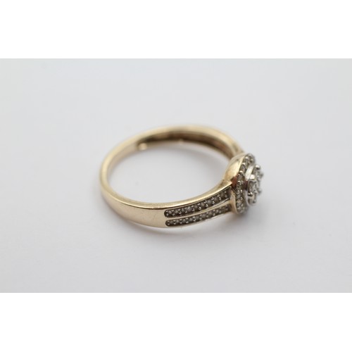 1032 - A 9ct gold diamond halo ring with diamond set shank, size P½ - approx. gross weight 2.5 grams