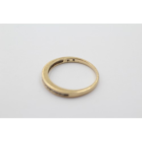 1037 - A 9ct gold diamond half eternity ring, size M½ - approx. gross weight 1.5 grams