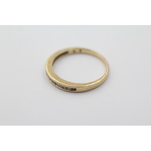 1037 - A 9ct gold diamond half eternity ring, size M½ - approx. gross weight 1.5 grams