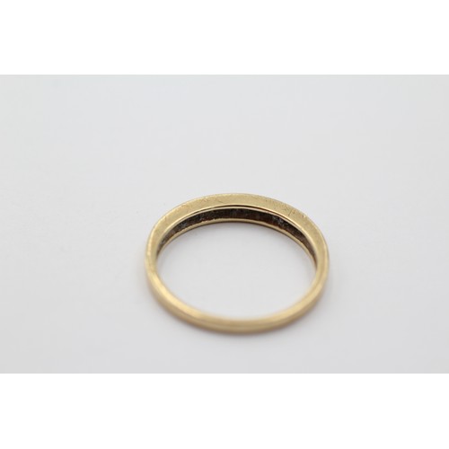 1037 - A 9ct gold diamond half eternity ring, size M½ - approx. gross weight 1.5 grams