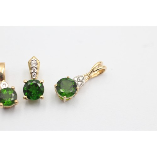 1049 - Three 9ct gold diamond and diopside pendants - approx. gross weight 2.6 grams