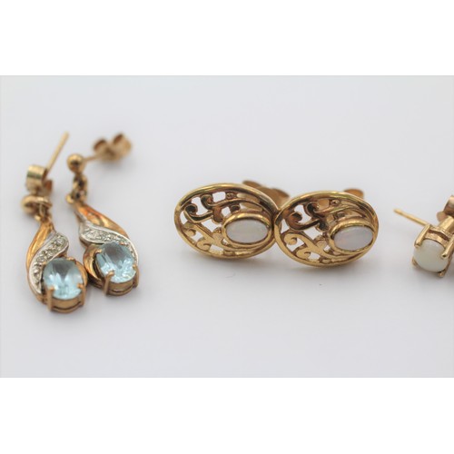 1050 - Three pairs of 9ct gold earrings, two opal and one topaz and diamond - approx. gross weight 4.5 gram... 