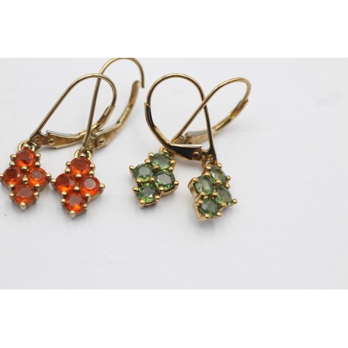 1055 - Three pairs of 9ct gold gemstone cluster earrings, one fire opal, one green sapphire and one clear g... 