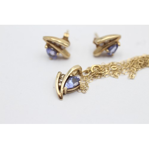 1059 - A 9ct gold tanzanite and diamond pendant necklace and earrings set - approx. gross weight 3 grams