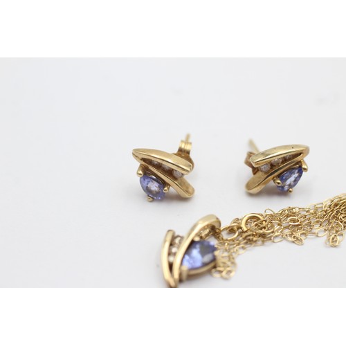 1059 - A 9ct gold tanzanite and diamond pendant necklace and earrings set - approx. gross weight 3 grams