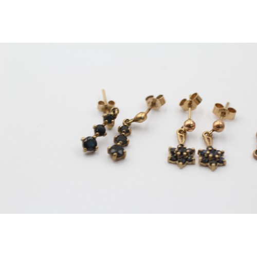 1061 - Three pairs of 9ct gold sapphire earrings - approx. gross weight 2.3 grams