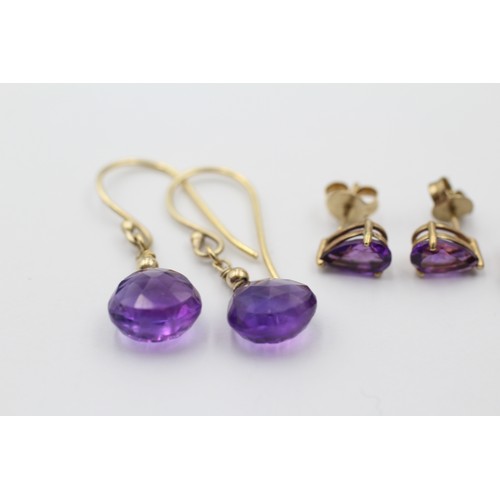 1062 - Three pairs of 9ct gold amethyst earrings - approx. gross weight 4.2 grams