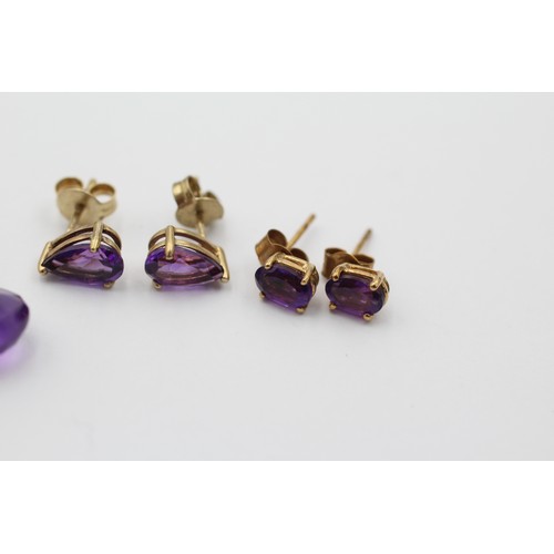 1062 - Three pairs of 9ct gold amethyst earrings - approx. gross weight 4.2 grams