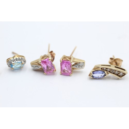 1064 - Three pairs of 9ct gold gemstone and diamond earrings, one pink sapphire, one topaz and one tanzanit... 