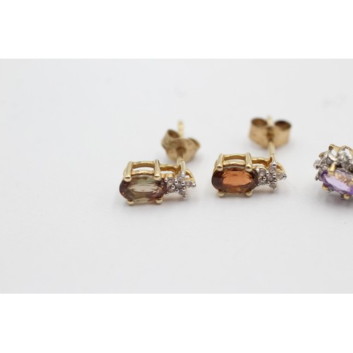 1065 - Two pairs of 9ct gold gemstone and diamond cluster earrings, amethyst and one citrine - approx. gros... 