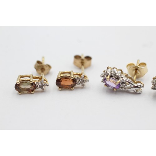 1065 - Two pairs of 9ct gold gemstone and diamond cluster earrings, amethyst and one citrine - approx. gros... 