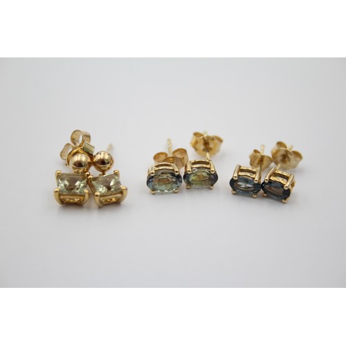 1066 - Three pairs of 9ct gold gemstone stud earrings - approx. gross weight 3.9 grams