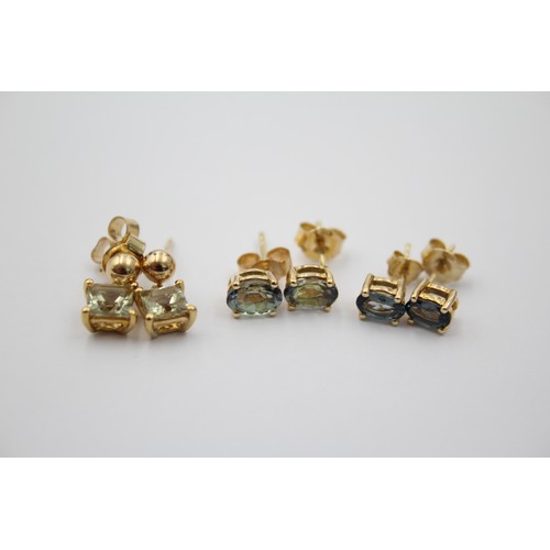 1066 - Three pairs of 9ct gold gemstone stud earrings - approx. gross weight 3.9 grams