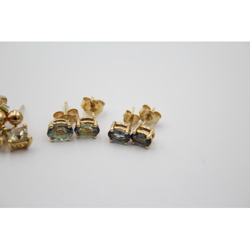 1066 - Three pairs of 9ct gold gemstone stud earrings - approx. gross weight 3.9 grams