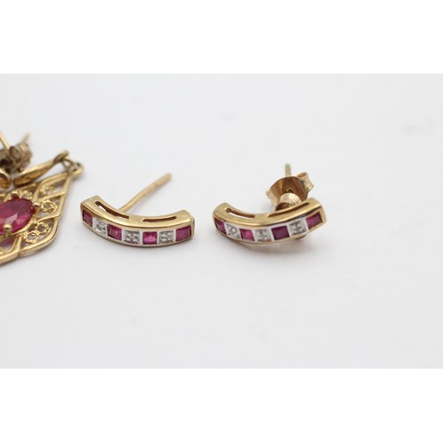 1067 - Two pairs of 9ct gold ruby set earrings, one with diamond - approx. gross weight 3 grams