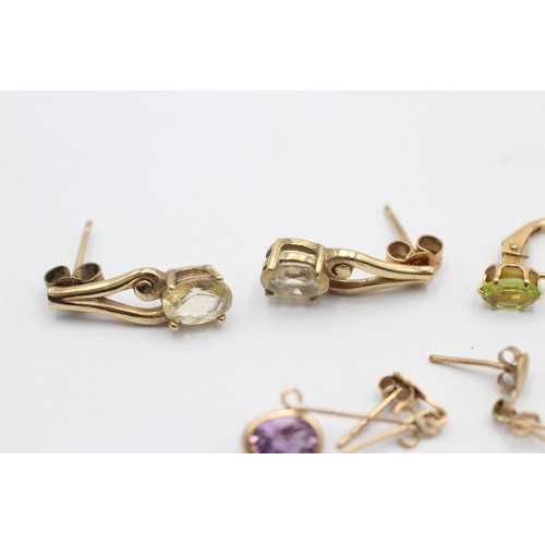 1068 - Three pairs of 9ct gold gemstone earrings, one amethyst, one peridot and one topaz - approx. gross w... 