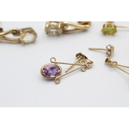 1068 - Three pairs of 9ct gold gemstone earrings, one amethyst, one peridot and one topaz - approx. gross w... 