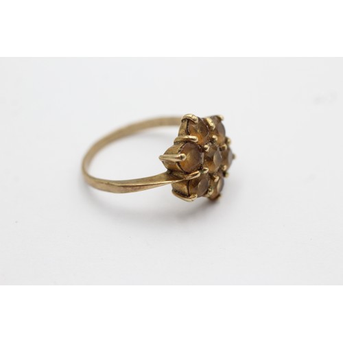 1074 - A 9ct gold citrine floral cluster ring, size S - approx. gross weight 3.8 grams