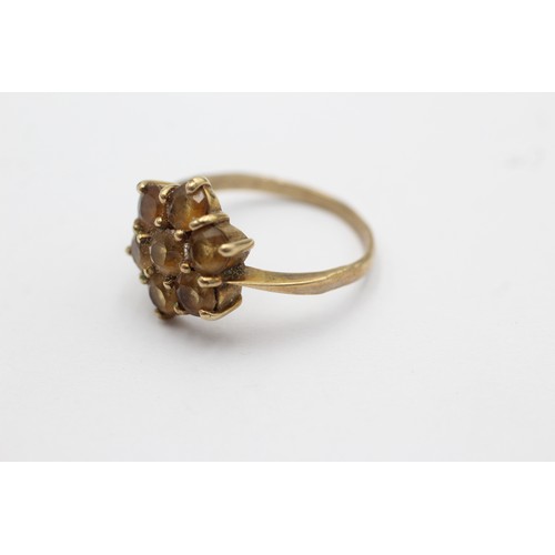 1074 - A 9ct gold citrine floral cluster ring, size S - approx. gross weight 3.8 grams