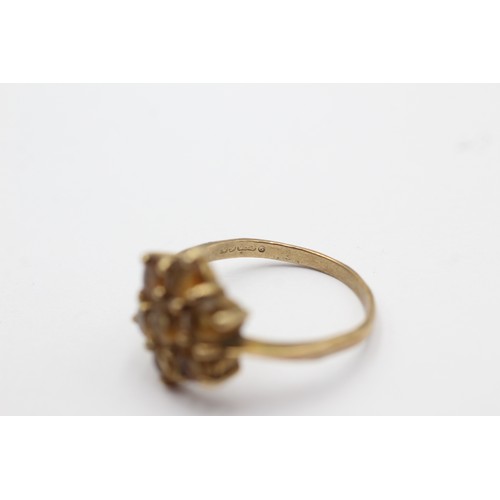 1074 - A 9ct gold citrine floral cluster ring, size S - approx. gross weight 3.8 grams