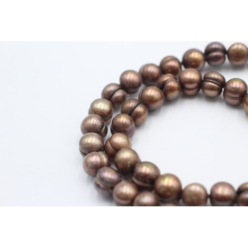 1075 - A 14ct gold clasp brown cultured pearl single strand necklace - approx. gross weight 54.5 grams